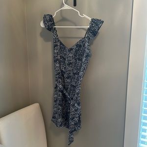 Blue romper with white print and tie waist